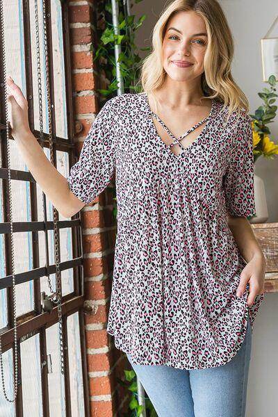 Heimish Full Size Short Sleeve Crisscross Animal Babydoll Top Plus Size