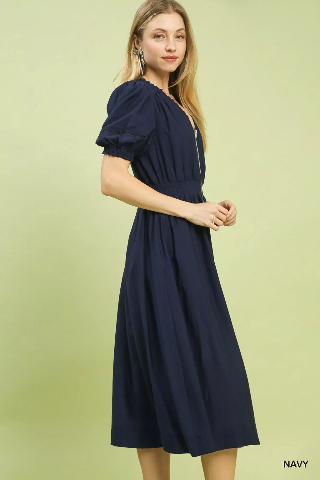 Umgee Zip-Front Smocked Waist Midi Dress is a chic and stylish piece for any occasion.