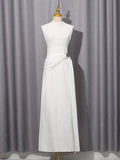 Autumn Arrival An Elegant Solid Color Sleeveless Dress With A Fitted Waist A Twisted Knot Detail At The Waist