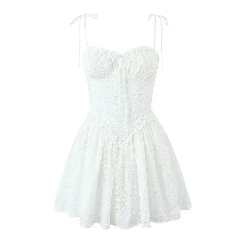 YENKYE Sexy Elegant Women Hollow Out Embroidery Yellow Sling Mini Dress Low Waist Lace Up Bandage Party Dresses Birthday Robe