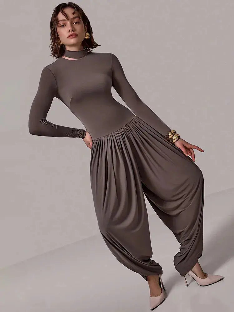 Slim-Fit Patchwork Jumpsuit with Draped Long Sleeves