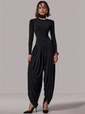 Slim-Fit Patchwork Jumpsuit with Draped Long Sleeves