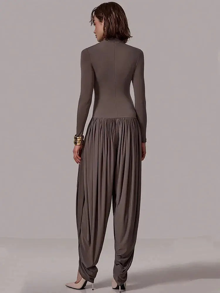 Slim-Fit Patchwork Jumpsuit with Draped Long Sleeves