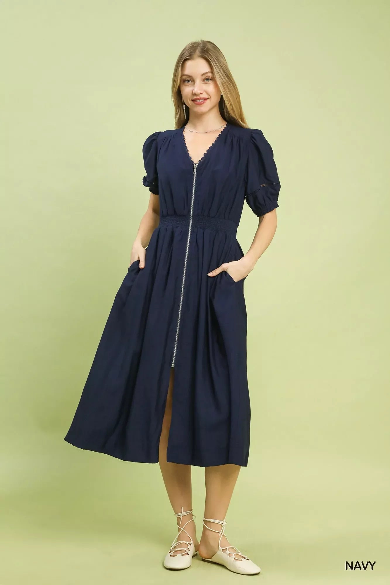 Umgee Zip-Front Smocked Waist Midi Dress is a chic and stylish piece for any occasion.